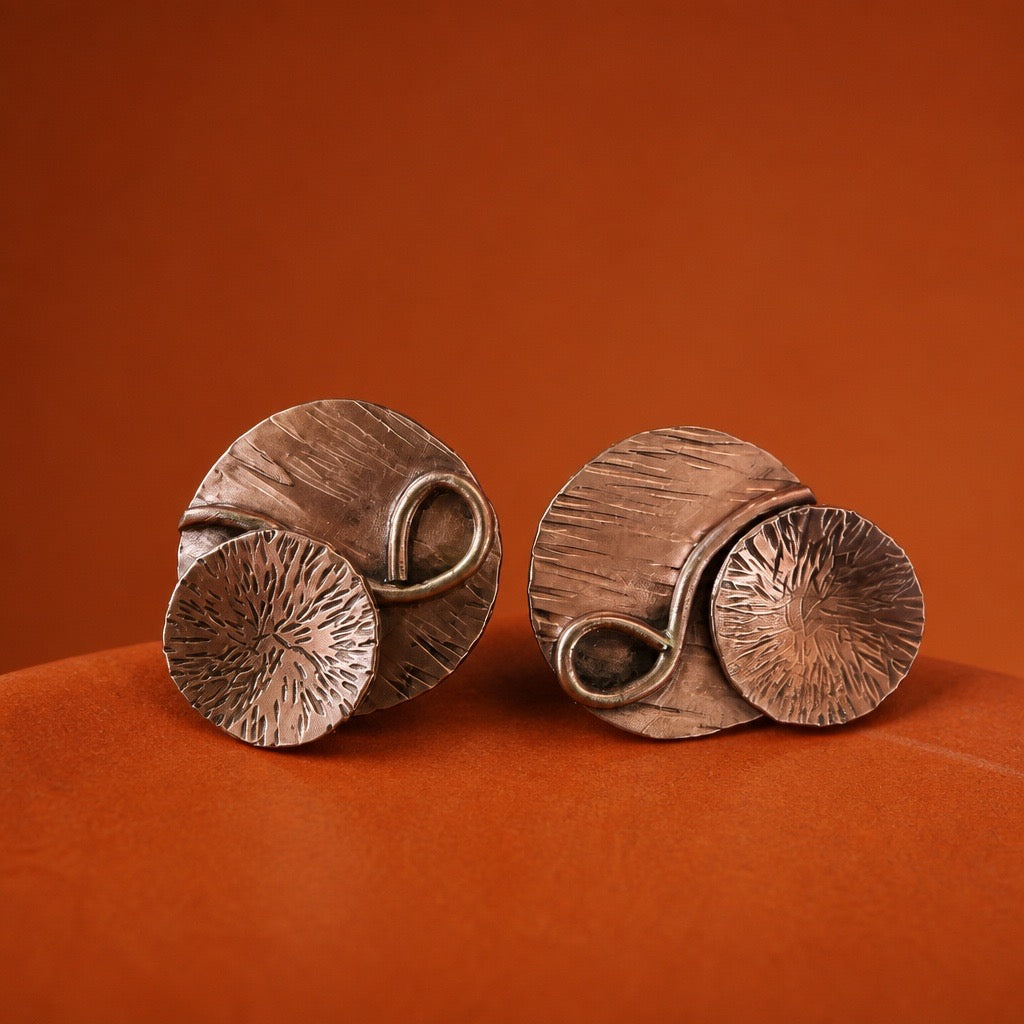 Handmade layered copper earrings with textured circles and hand-formed corves - solid copper artisan stud earrings by Ginny Taylor Designs, Roanoke, VA